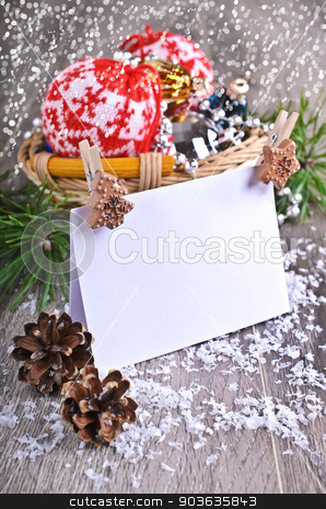 To use this stock image in your creative project, please select the size you need over to the right and click the "Add to Cart" button.
Your downloaded image will come with the Cutcaster watermark removed so don’t worry about the watermark you see on this page. Christmas composition stock photo, Christmas composition with ornaments, pine cones, branches of fir trees and artificial snow by zia_shusha