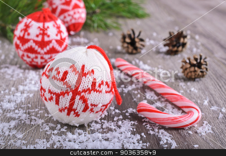 To use this stock image in your creative project, please select the size you need over to the right and click the "Add to Cart" button.
Your downloaded image will come with the Cutcaster watermark removed so don’t worry about the watermark you see on this page. Christmas composition stock photo, Christmas composition with ornaments, pine cones, branches of fir trees and artificial snow by zia_shusha