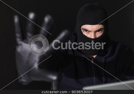 To use this stock image in your creative project, please select the size you need over to the right and click the "Add to Cart" button.
Your downloaded image will come with the Cutcaster watermark removed so don’t worry about the watermark you see on this page. Hacker in balaclava gesturing and looking at camera stock photo, Hacker in balaclava gesturing and looking at camera on black background by Wavebreak Media