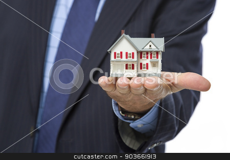 To use this stock image in your creative project, please select the size you need over to the right and click the "Add to Cart" button.
Your downloaded image will come with the Cutcaster watermark removed so don’t worry about the watermark you see on this page. Male Real Estate Agent Holding Miniature House in Palm stock photo, Close Up of Male Real Estate Agent Holding Out A Miniature House in His Hand. by Andy Dean