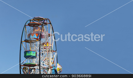 To use this stock image in your creative project, please select the size you need over to the right and click the "Add to Cart" button.
Your downloaded image will come with the Cutcaster watermark removed so don’t worry about the watermark you see on this page. Ferris wheel background stock photo, Ferris wheel with blue sky background and copy space. by Martin Crowdy