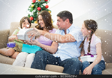 To use this stock image in your creative project, please select the size you need over to the right and click the "Add to Cart" button.
Your downloaded image will come with the Cutcaster watermark removed so don’t worry about the watermark you see on this page. Composite image of family exchanging christmas presents stock photo, Composite image of Family exchanging Christmas presents against snow falling by Wavebreak Media