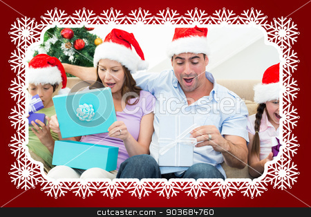 To use this stock image in your creative project, please select the size you need over to the right and click the "Add to Cart" button.
Your downloaded image will come with the Cutcaster watermark removed so don’t worry about the watermark you see on this page. Composite image of family opening christmas presents stock photo, Composite image of family opening Christmas presents against snowflake frame by Wavebreak Media