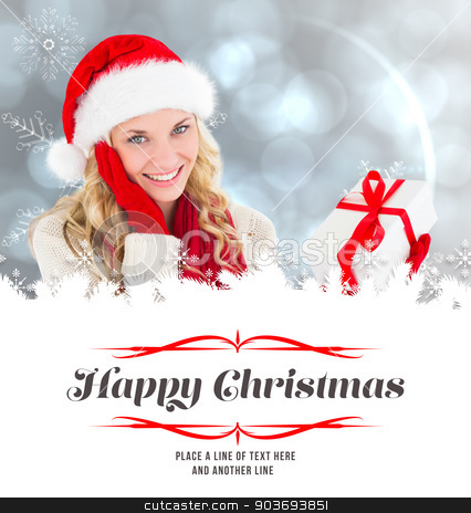 To use this stock image in your creative project, please select the size you need over to the right and click the "Add to Cart" button.
Your downloaded image will come with the Cutcaster watermark removed so don’t worry about the watermark you see on this page. Composite image of happy festive blonde with gift stock photo, happy festive blonde with gift against border by Wavebreak Media