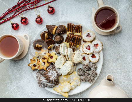 To use this stock image in your creative project, please select the size you need over to the right and click the "Add to Cart" button.
Your downloaded image will come with the Cutcaster watermark removed so don’t worry about the watermark you see on this page. Christmas cookies and fresh tea stock photo, Christmas cookies and fresh tea, showy, plate and background by Peteer