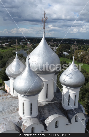 To use this stock image in your creative project, please select the size you need over to the right and click the "Add to Cart" button.
Your downloaded image will come with the Cutcaster watermark removed so don’t worry about the watermark you see on this page. Church domes top view stock photo, Saint Sophia Cathedral in Vologda Top view from height of bird's flight by mrivserg