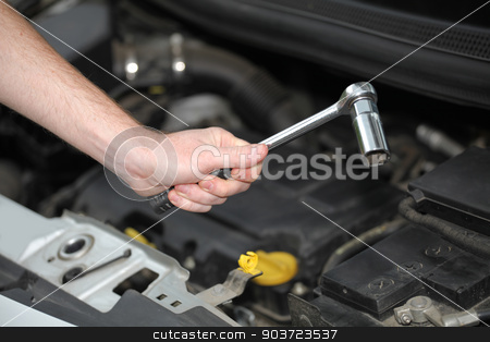 To use this stock image in your creative project, please select the size you need over to the right and click the "Add to Cart" button.
Your downloaded image will come with the Cutcaster watermark removed so don’t worry about the watermark you see on this page. Auto mechanic with chrome plated wrench in closeup stock photo, Auto mechanic with chrome plated wrench in closeup. Auto mechanic in car repair by vladacanon1