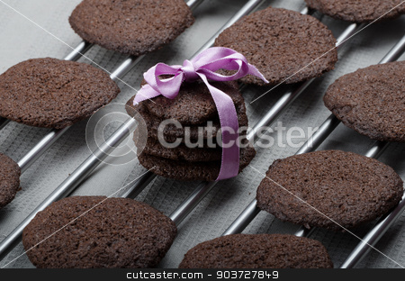 To use this stock image in your creative project, please select the size you need over to the right and click the "Add to Cart" button.
Your downloaded image will come with the Cutcaster watermark removed so don’t worry about the watermark you see on this page. Dark chocolate biscuits stock photo, Dark chocolate biscuits, homemade, 80 percent chocolate by Peteer