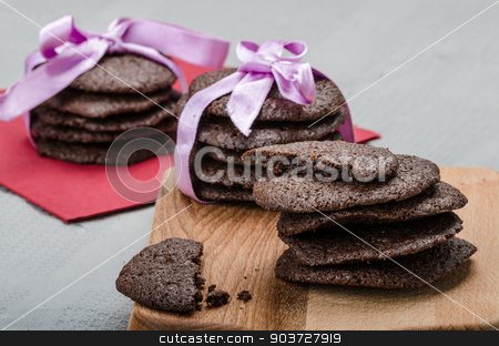 To use this stock image in your creative project, please select the size you need over to the right and click the "Add to Cart" button.
Your downloaded image will come with the Cutcaster watermark removed so don’t worry about the watermark you see on this page. Dark chocolate biscuits stock photo, Dark chocolate biscuits, homemade, 80 percent chocolate by Peteer