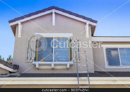 To use this stock image in your creative project, please select the size you need over to the right and click the "Add to Cart" button.
Your downloaded image will come with the Cutcaster watermark removed so don’t worry about the watermark you see on this page. Ladder Leaning Up Against A House Ready For New Paint stock photo, Construction Ladder Leaning Up Against A House Ready For New Paint. by Andy Dean