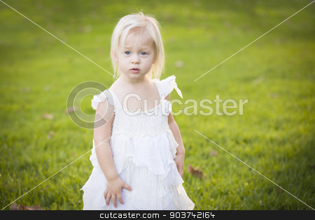 To use this stock image in your creative project, please select the size you need over to the right and click the "Add to Cart" button.
Your downloaded image will come with the Cutcaster watermark removed so don’t worry about the watermark you see on this page. Adorable Little Girl Wearing White Dress In A Grass Field stock photo, Beautiful Adorable Little Girl Wearing White Dress In A Grass Field. by Andy Dean