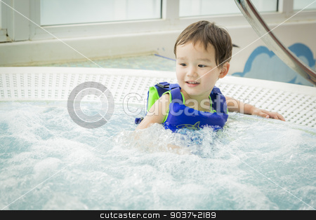 To use this stock image in your creative project, please select the size you need over to the right and click the "Add to Cart" button.
Your downloaded image will come with the Cutcaster watermark removed so don’t worry about the watermark you see on this page. Mixed Race Boy Having Fun at the Water Park stock photo, Adorable Mixed Race Boy Having Fun at the Water Park. by Andy Dean