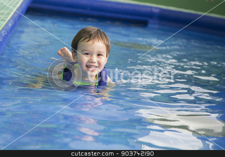 To use this stock image in your creative project, please select the size you need over to the right and click the "Add to Cart" button.
Your downloaded image will come with the Cutcaster watermark removed so don’t worry about the watermark you see on this page. Mixed Race Boy Having Fun at the Water Park stock photo, Adorable Mixed Race Boy Having Fun at the Water Park. by Andy Dean