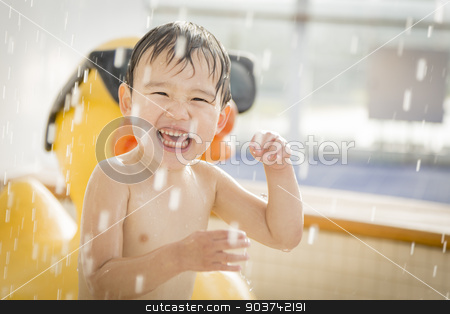To use this stock image in your creative project, please select the size you need over to the right and click the "Add to Cart" button.
Your downloaded image will come with the Cutcaster watermark removed so don’t worry about the watermark you see on this page. Mixed Race Boy Having Fun at the Water Park stock photo, Mixed Race Boy Having Fun at the Water Park with Large Rubber Duck in the Background. by Andy Dean
