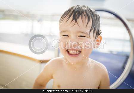 To use this stock image in your creative project, please select the size you need over to the right and click the "Add to Cart" button.
Your downloaded image will come with the Cutcaster watermark removed so don’t worry about the watermark you see on this page. Mixed Race Boy Having Fun at the Water Park stock photo, Mixed Race Boy Having Fun at the Water Park with Large Rubber Duck in the Background. by Andy Dean