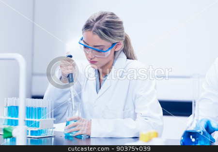 To use this stock image in your creative project, please select the size you need over to the right and click the "Add to Cart" button.
Your downloaded image will come with the Cutcaster watermark removed so don’t worry about the watermark you see on this page. Science student using pipette in the lab stock photo, Science student using pipette in the lab at the university by Wavebreak Media