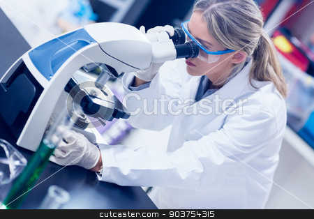 To use this stock image in your creative project, please select the size you need over to the right and click the "Add to Cart" button.
Your downloaded image will come with the Cutcaster watermark removed so don’t worry about the watermark you see on this page. Science student looking through microscope in the lab stock photo, Science student looking through microscope in the lab at the university by Wavebreak Media