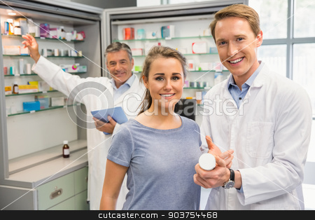 To use this stock image in your creative project, please select the size you need over to the right and click the "Add to Cart" button.
Your downloaded image will come with the Cutcaster watermark removed so don’t worry about the watermark you see on this page. Happy customer talking with pharmacist stock photo, Happy customer talking with pharmacist at the hospital pharmacy by Wavebreak Media