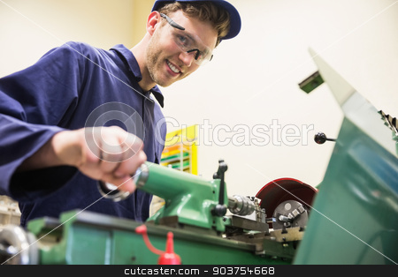 To use this stock image in your creative project, please select the size you need over to the right and click the "Add to Cart" button.
Your downloaded image will come with the Cutcaster watermark removed so don’t worry about the watermark you see on this page. Engineering student using heavy machinery stock photo, Engineering student using heavy machinery at the university by Wavebreak Media