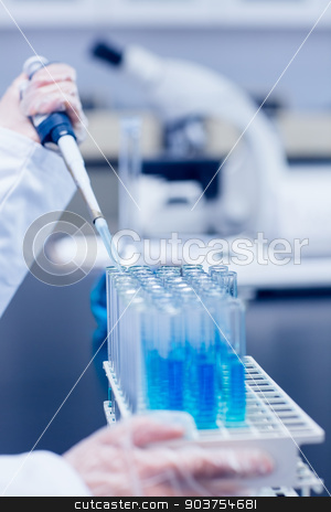 To use this stock image in your creative project, please select the size you need over to the right and click the "Add to Cart" button.
Your downloaded image will come with the Cutcaster watermark removed so don’t worry about the watermark you see on this page. Science student using pipette in the lab to fill test tubes stock photo, Science student using pipette in the lab to fill test tubes at the university by Wavebreak Media