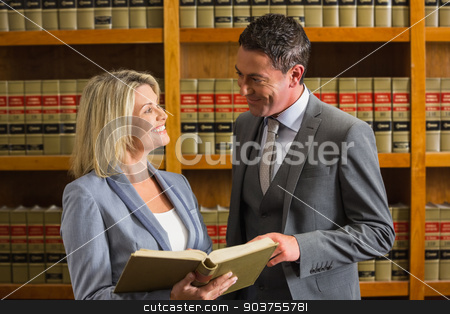To use this stock image in your creative project, please select the size you need over to the right and click the "Add to Cart" button.
Your downloaded image will come with the Cutcaster watermark removed so don’t worry about the watermark you see on this page. Lawyers reading book in the law library stock photo, Lawyers reading book in the law library at the university by Wavebreak Media