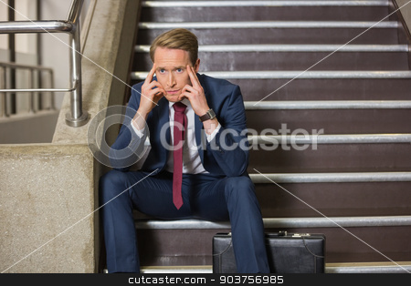 To use this stock image in your creative project, please select the size you need over to the right and click the "Add to Cart" button.
Your downloaded image will come with the Cutcaster watermark removed so don’t worry about the watermark you see on this page. Stressed businessman sitting on steps stock photo, Stressed businessman sitting on steps in office building by Wavebreak Media