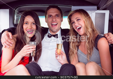 To use this stock image in your creative project, please select the size you need over to the right and click the "Add to Cart" button.
Your downloaded image will come with the Cutcaster watermark removed so don’t worry about the watermark you see on this page. Pretty girls with ladies man in the limousine stock photo, Pretty girls with ladies man in the limousine on a night out by Wavebreak Media
