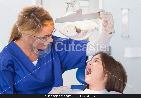 To use this stock image in your creative project, please select the size you need over to the right and click the "Add to Cart" button.
Your downloaded image will come with the Cutcaster watermark removed so don’t worry about the watermark you see on this page. Pediatric dentist examining with a light her young patient stock photo, Pediatric dentist examining with a light her young patient in dental clinic by Wavebreak Media