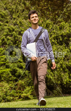 To use this stock image in your creative project, please select the size you need over to the right and click the "Add to Cart" button.
Your downloaded image will come with the Cutcaster watermark removed so don’t worry about the watermark you see on this page. Student walking with shoulder bag and holding notepad stock photo, Student walking with shoulder bag and holding notepad in park at school by Wavebreak Media