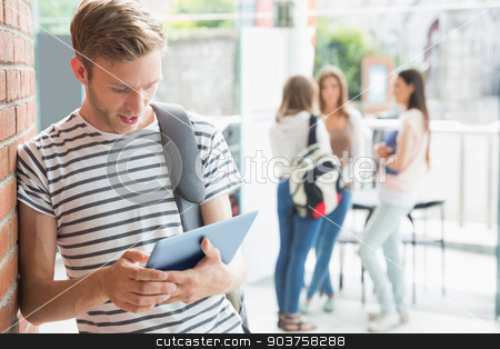 To use this stock image in your creative project, please select the size you need over to the right and click the "Add to Cart" button.
Your downloaded image will come with the Cutcaster watermark removed so don’t worry about the watermark you see on this page. Handsome student smiling and holding tablet stock photo, Handsome student smiling and holding tablet at the university by Wavebreak Media