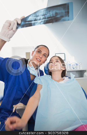 To use this stock image in your creative project, please select the size you need over to the right and click the "Add to Cart" button.
Your downloaded image will come with the Cutcaster watermark removed so don’t worry about the watermark you see on this page. Pediatric dentist explaining to young patient the x-ray stock photo, Pediatric dentist explaining to young patient the x-ray in dental clinic by Wavebreak Media