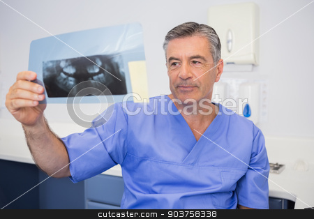 To use this stock image in your creative project, please select the size you need over to the right and click the "Add to Cart" button.
Your downloaded image will come with the Cutcaster watermark removed so don’t worry about the watermark you see on this page. Thoughtful dentist studying x-ray attentively stock photo, Thoughtful dentist studying x-ray attentively in dental clinic by Wavebreak Media