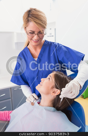 To use this stock image in your creative project, please select the size you need over to the right and click the "Add to Cart" button.
Your downloaded image will come with the Cutcaster watermark removed so don’t worry about the watermark you see on this page. Smiling pediatric dentist with a happy young patient stock photo, Smiling pediatric dentist with a happy young patient in dental clinic by Wavebreak Media