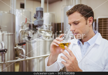 To use this stock image in your creative project, please select the size you need over to the right and click the "Add to Cart" button.
Your downloaded image will come with the Cutcaster watermark removed so don’t worry about the watermark you see on this page. Focused brewer smelling beaker with beer stock photo, Focused brewer smelling beaker with beer in the factory by Wavebreak Media