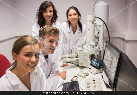To use this stock image in your creative project, please select the size you need over to the right and click the "Add to Cart" button.
Your downloaded image will come with the Cutcaster watermark removed so don’t worry about the watermark you see on this page. Biochemistry students using large microscope and computer stock photo, Biochemistry students using large microscope and computer at the university by Wavebreak Media