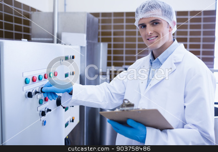 To use this stock image in your creative project, please select the size you need over to the right and click the "Add to Cart" button.
Your downloaded image will come with the Cutcaster watermark removed so don’t worry about the watermark you see on this page. Smiling biologist using the machine stock photo, Smiling biologist using the machine in the factory by Wavebreak Media