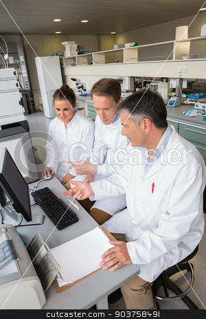 To use this stock image in your creative project, please select the size you need over to the right and click the "Add to Cart" button.
Your downloaded image will come with the Cutcaster watermark removed so don’t worry about the watermark you see on this page. Team of scientists working together stock photo, Team of scientists working together at the laboratory by Wavebreak Media
