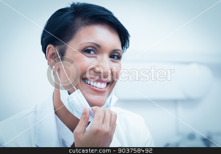 To use this stock image in your creative project, please select the size you need over to the right and click the "Add to Cart" button.
Your downloaded image will come with the Cutcaster watermark removed so don’t worry about the watermark you see on this page. Confident female dentist smiling stock photo, Portrait of a confident female dentist smiling by Wavebreak Media