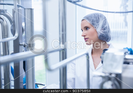To use this stock image in your creative project, please select the size you need over to the right and click the "Add to Cart" button.
Your downloaded image will come with the Cutcaster watermark removed so don’t worry about the watermark you see on this page. Portrait of a smiling scientist behind metal pipe stock photo, Portrait of a smiling scientist behind metal pipe in the factory by Wavebreak Media