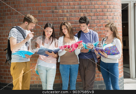 To use this stock image in your creative project, please select the size you need over to the right and click the "Add to Cart" button.
Your downloaded image will come with the Cutcaster watermark removed so don’t worry about the watermark you see on this page. Happy students standing and reading stock photo, Happy students standing and reading at the university by Wavebreak Media