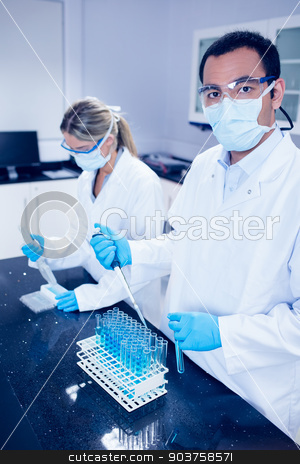 To use this stock image in your creative project, please select the size you need over to the right and click the "Add to Cart" button.
Your downloaded image will come with the Cutcaster watermark removed so don’t worry about the watermark you see on this page. Science students using pipettes to fill test tubes stock photo, Science students using pipettes to fill test tubes at the university by Wavebreak Media