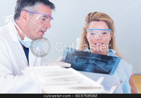 To use this stock image in your creative project, please select the size you need over to the right and click the "Add to Cart" button.
Your downloaded image will come with the Cutcaster watermark removed so don’t worry about the watermark you see on this page. Dentist showing x-ray to his patient stock photo, Dentist showing x-ray to his patient at the dental clinic by Wavebreak Media