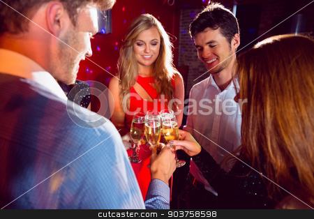 To use this stock image in your creative project, please select the size you need over to the right and click the "Add to Cart" button.
Your downloaded image will come with the Cutcaster watermark removed so don’t worry about the watermark you see on this page. Happy friends toasting with champagne stock photo, Happy friends toasting with champagne at the nightclub by Wavebreak Media