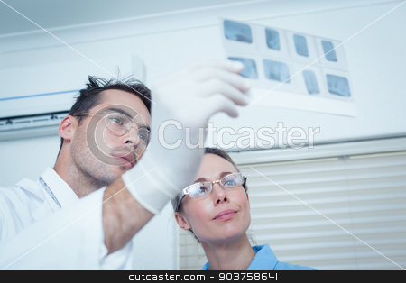 To use this stock image in your creative project, please select the size you need over to the right and click the "Add to Cart" button.
Your downloaded image will come with the Cutcaster watermark removed so don’t worry about the watermark you see on this page. Dentists looking at x-ray stock photo, Concentrated two dentists looking at x-ray by Wavebreak Media