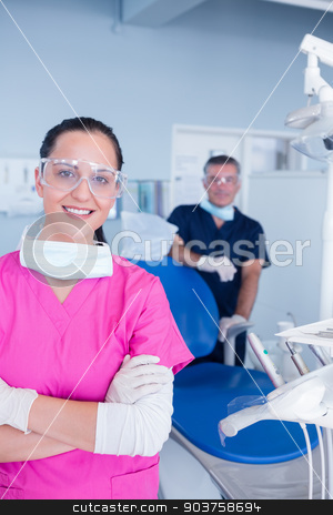 To use this stock image in your creative project, please select the size you need over to the right and click the "Add to Cart" button.
Your downloaded image will come with the Cutcaster watermark removed so don’t worry about the watermark you see on this page. Smiling assistant and dentist behind her with protective glasses stock photo, Smiling assistant and dentist behind her with protective glasses at the dental clinic by Wavebreak Media