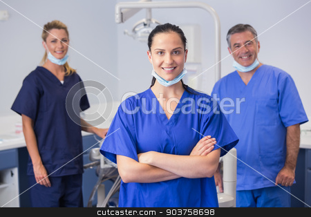 To use this stock image in your creative project, please select the size you need over to the right and click the "Add to Cart" button.
Your downloaded image will come with the Cutcaster watermark removed so don’t worry about the watermark you see on this page. Portrait of smiling co-workers standing stock photo, Portrait of smiling co-workers standing in dental clinic by Wavebreak Media