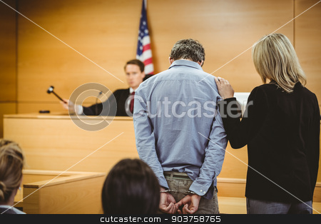 To use this stock image in your creative project, please select the size you need over to the right and click the "Add to Cart" button.
Your downloaded image will come with the Cutcaster watermark removed so don’t worry about the watermark you see on this page. Judge about to bang gavel on sounding block stock photo, Judge about to bang gavel on sounding block in the court room by Wavebreak Media