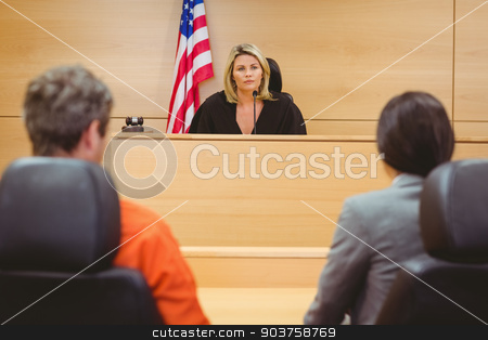 To use this stock image in your creative project, please select the size you need over to the right and click the "Add to Cart" button.
Your downloaded image will come with the Cutcaster watermark removed so don’t worry about the watermark you see on this page. Judge and lawyer discussing the sentence for prisoner stock photo, Judge and lawyer discussing the sentence for prisoner in the court room by Wavebreak Media