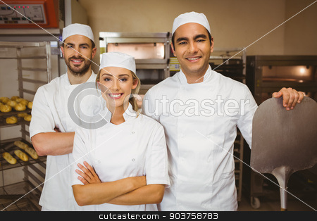 To use this stock image in your creative project, please select the size you need over to the right and click the "Add to Cart" button.
Your downloaded image will come with the Cutcaster watermark removed so don’t worry about the watermark you see on this page. Team of bakers smiling at camera stock photo, Team of bakers smiling at camera in a commercial kitchen by Wavebreak Media