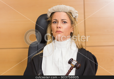 To use this stock image in your creative project, please select the size you need over to the right and click the "Add to Cart" button.
Your downloaded image will come with the Cutcaster watermark removed so don’t worry about the watermark you see on this page. Stern judge sitting and listening stock photo, Stern judge sitting and listening in the court room by Wavebreak Media